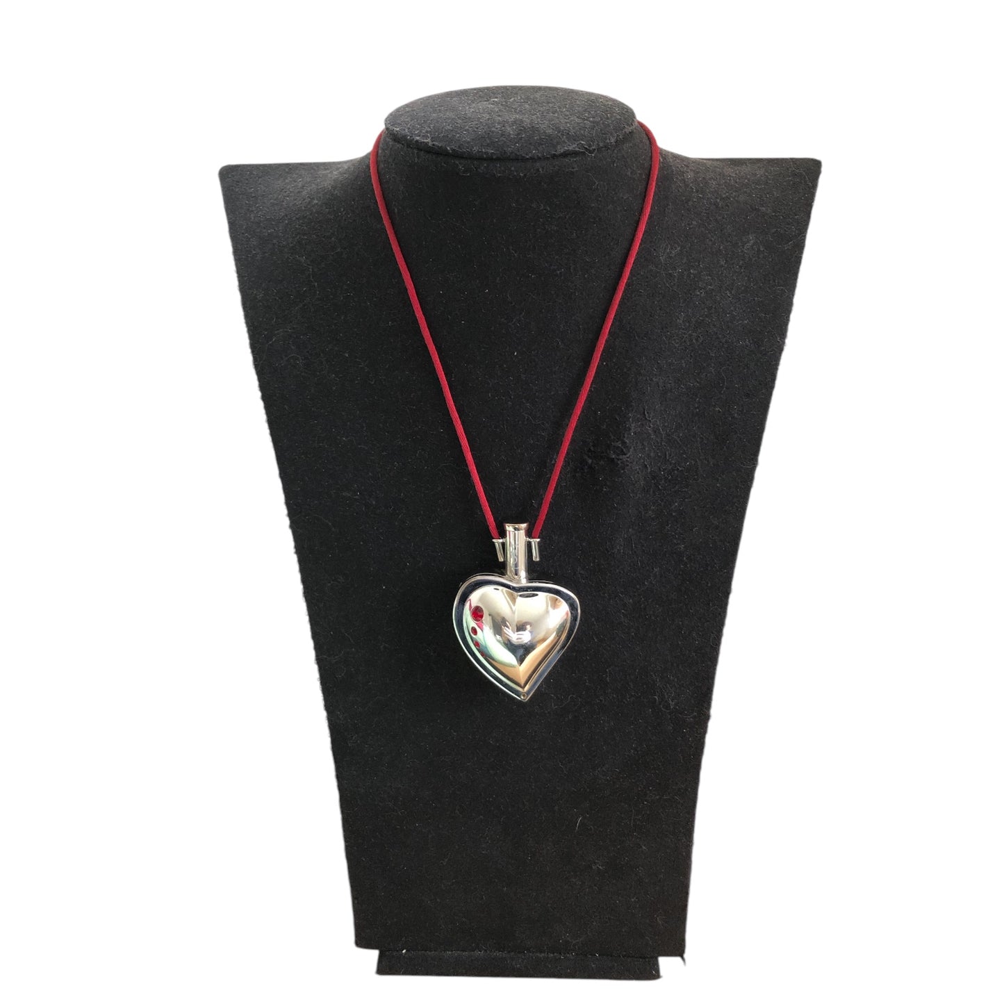 Pendant signed “Yves Saint Laurent”