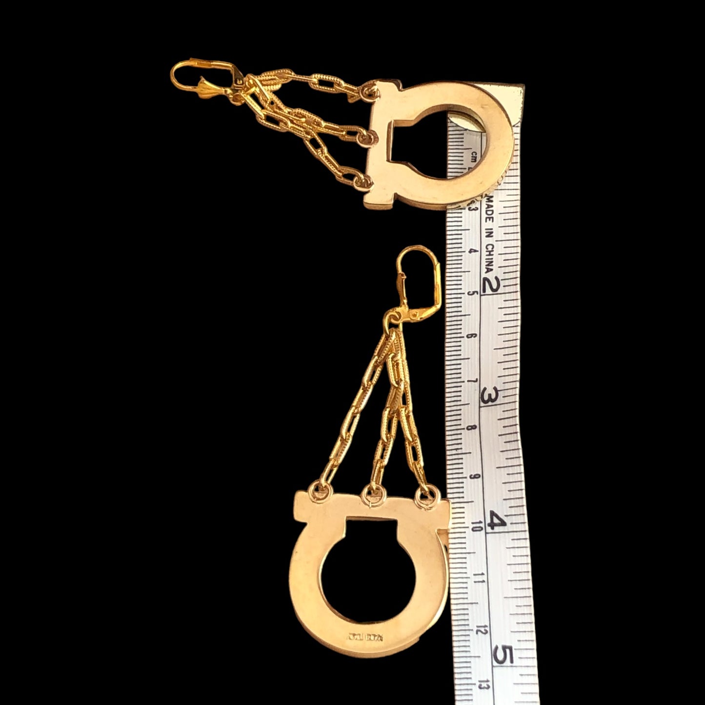 Earrings signed "Ferragamo"