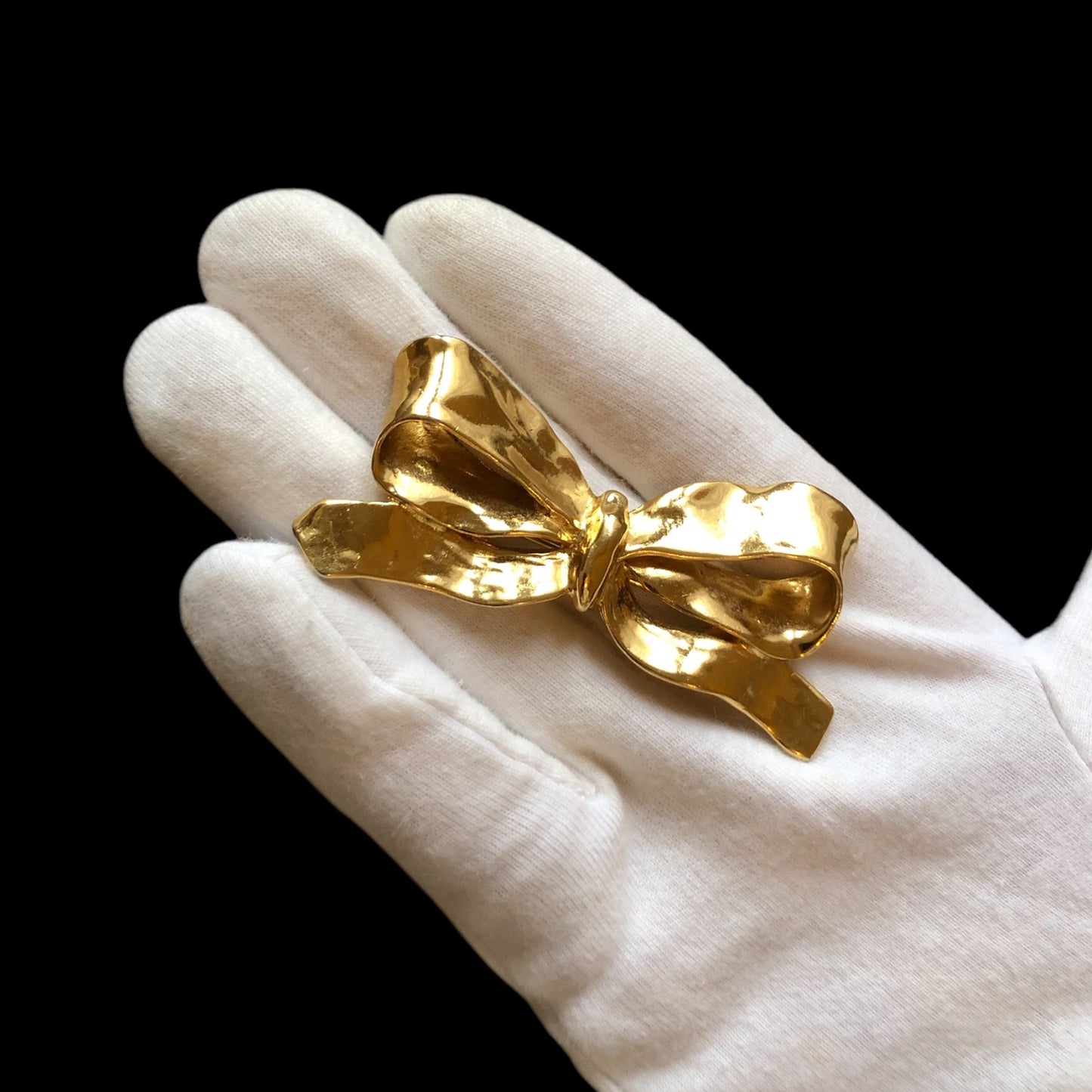 Brooch signed “Yves Saint Laurent”
