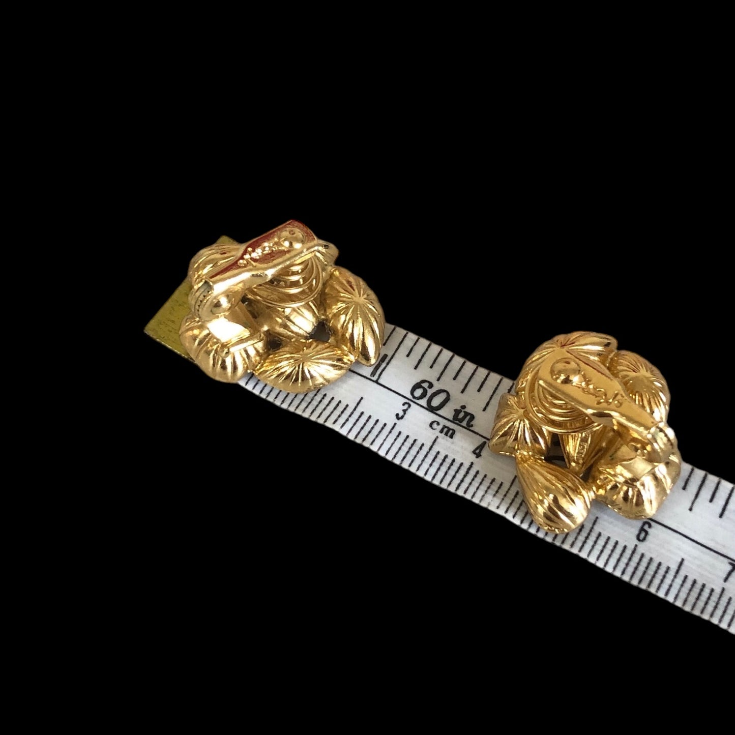 Clip earrings signed "Yves Saint Laurent"