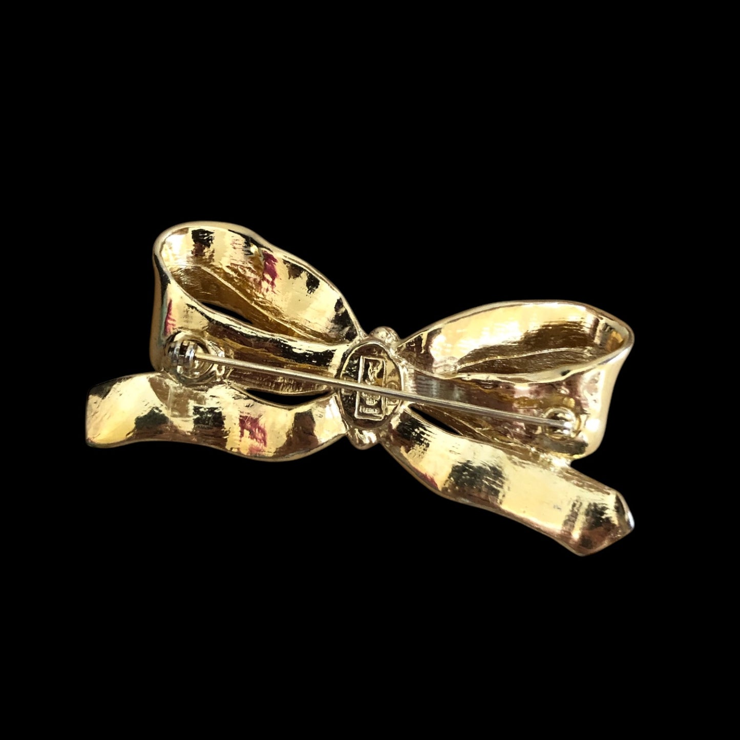 Brooch signed “Yves Saint Laurent”