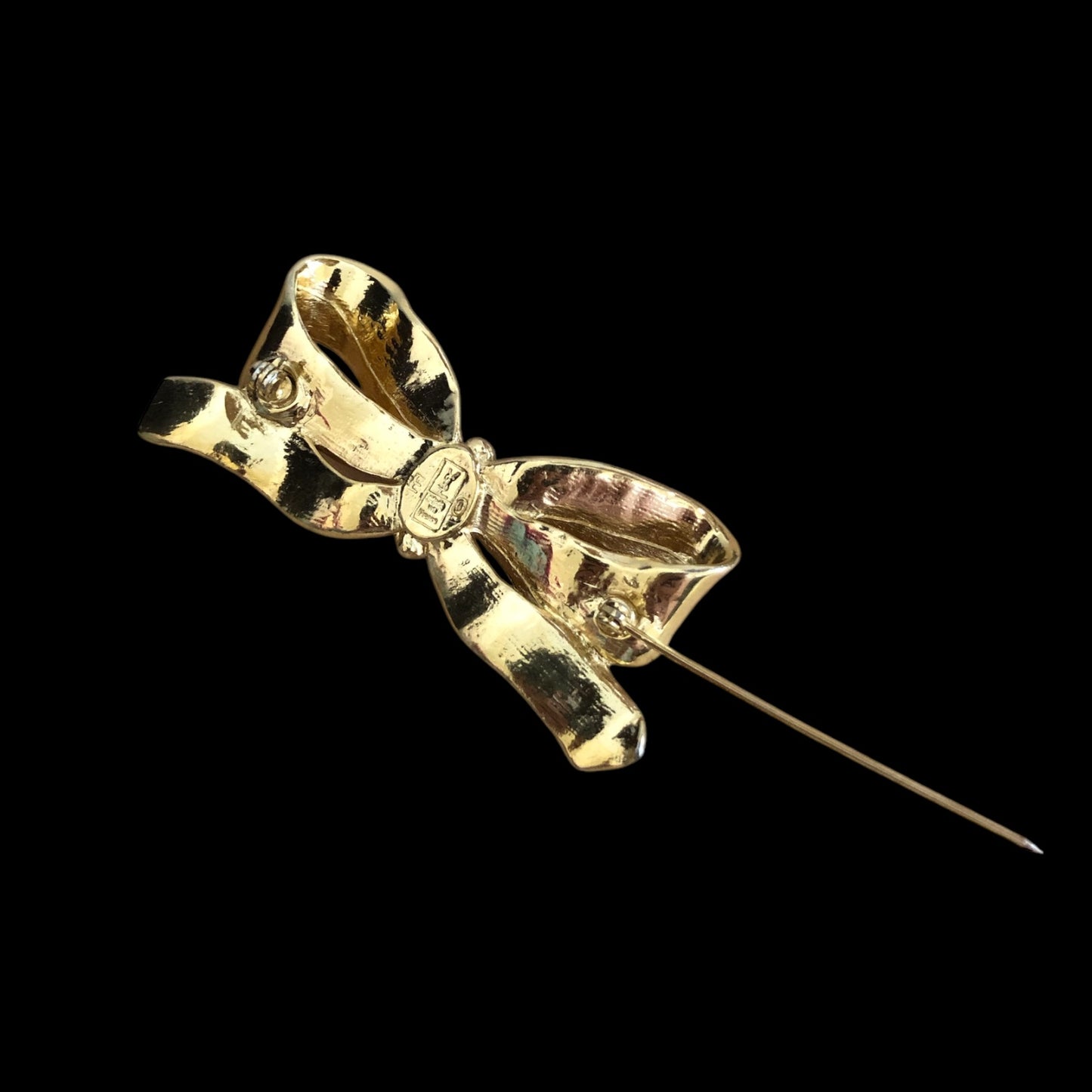 Brooch signed “Yves Saint Laurent”