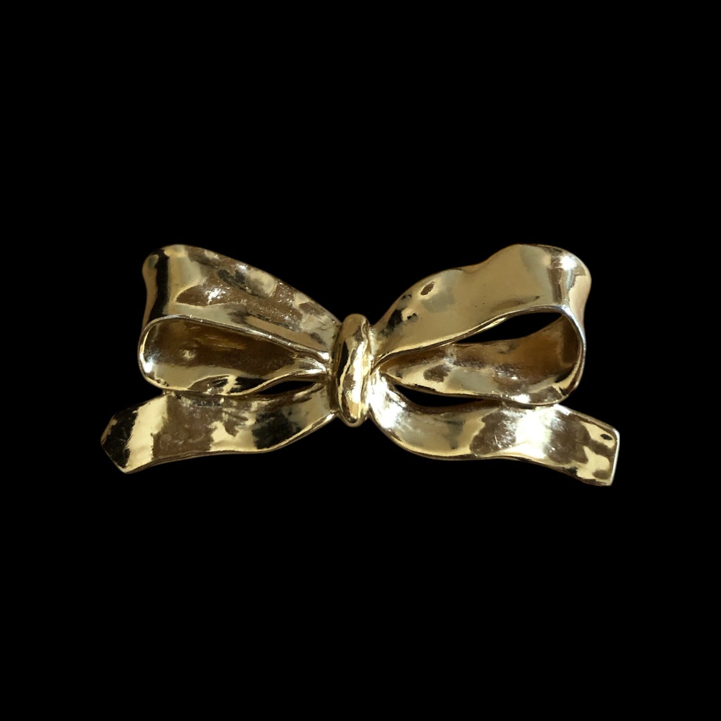 Brooch signed “Yves Saint Laurent”