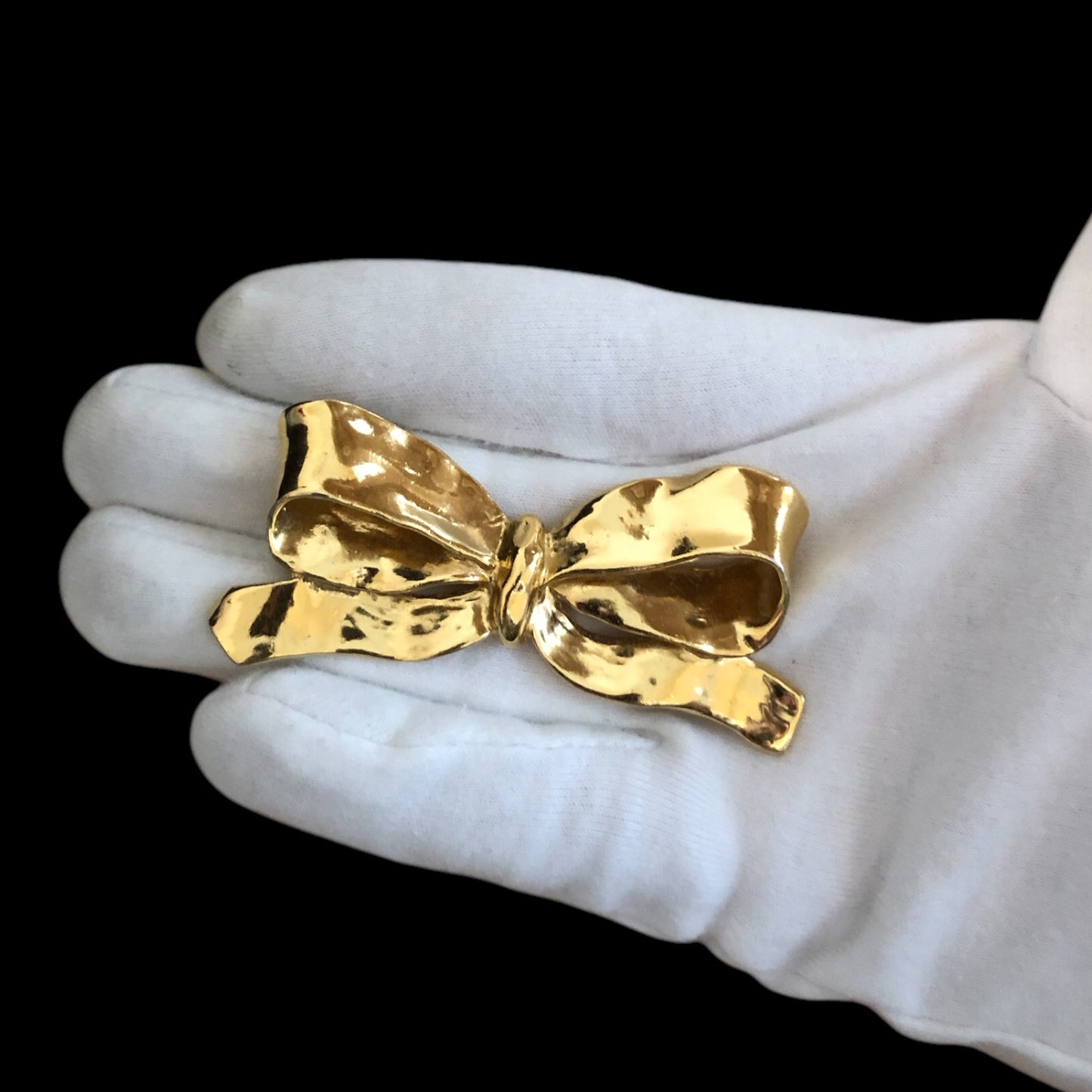 Brooch signed “Yves Saint Laurent”