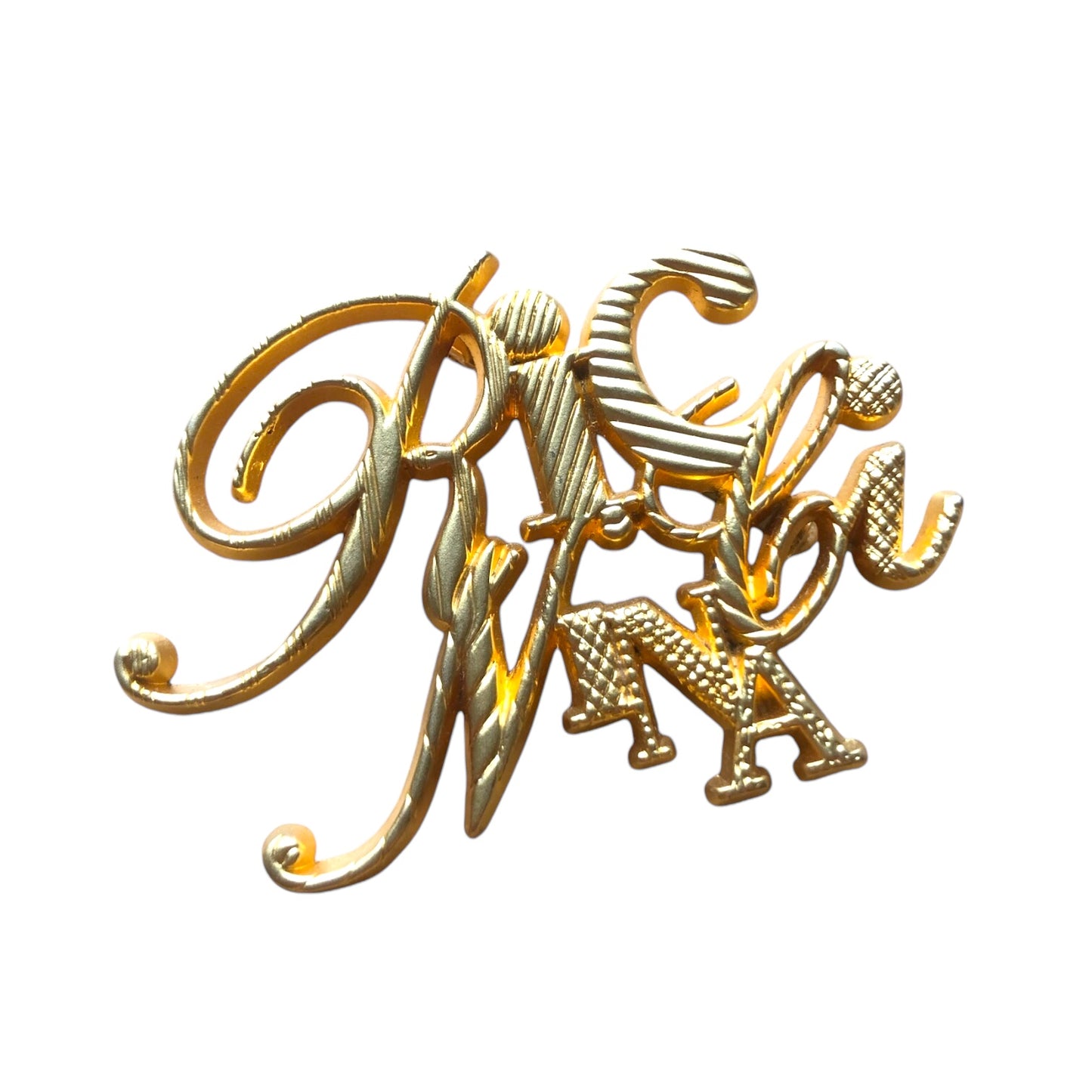 Brooch signed “Nina Ricci”