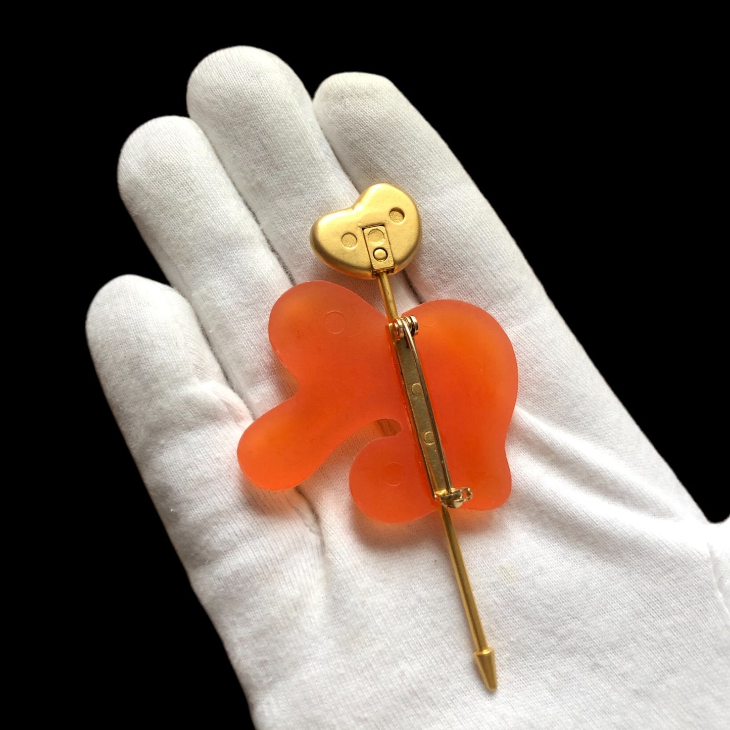 Brooch signed “Nina Ricci”