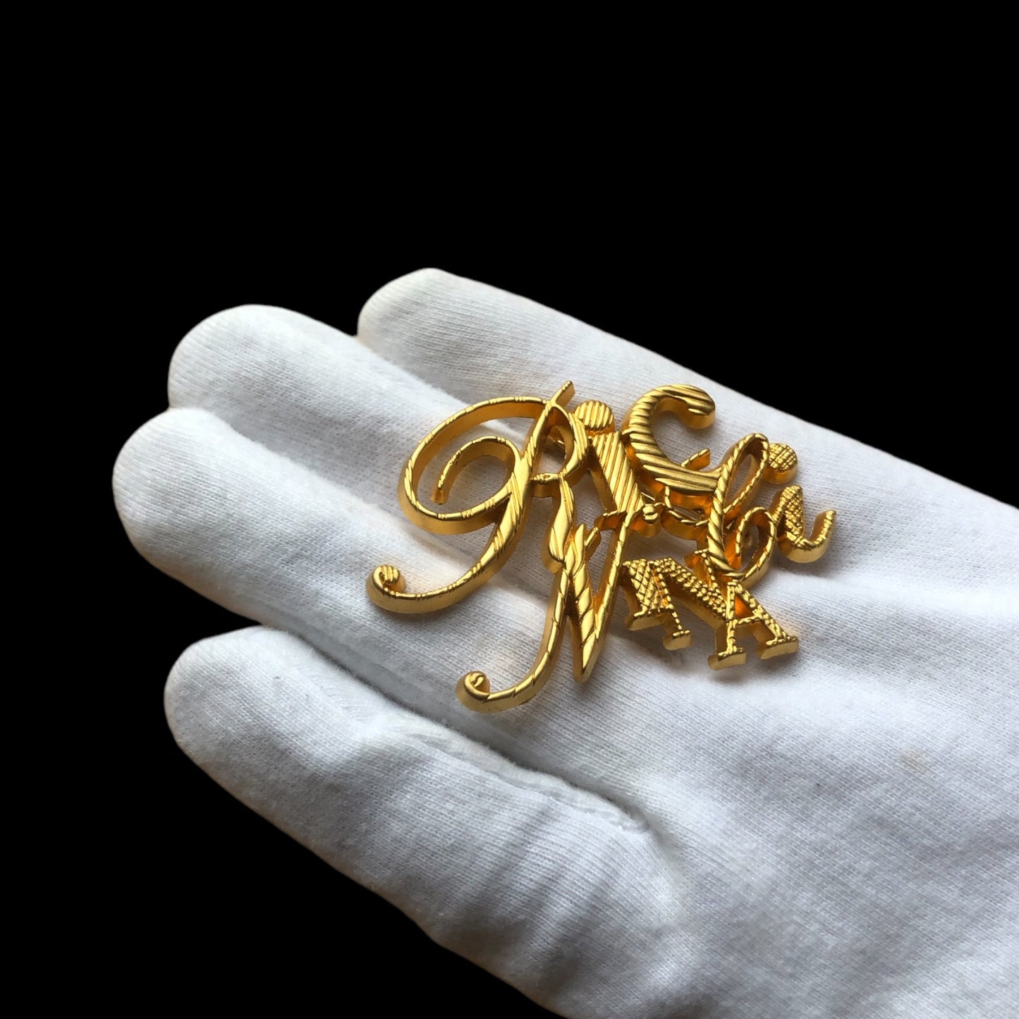 Brooch signed “Nina Ricci”