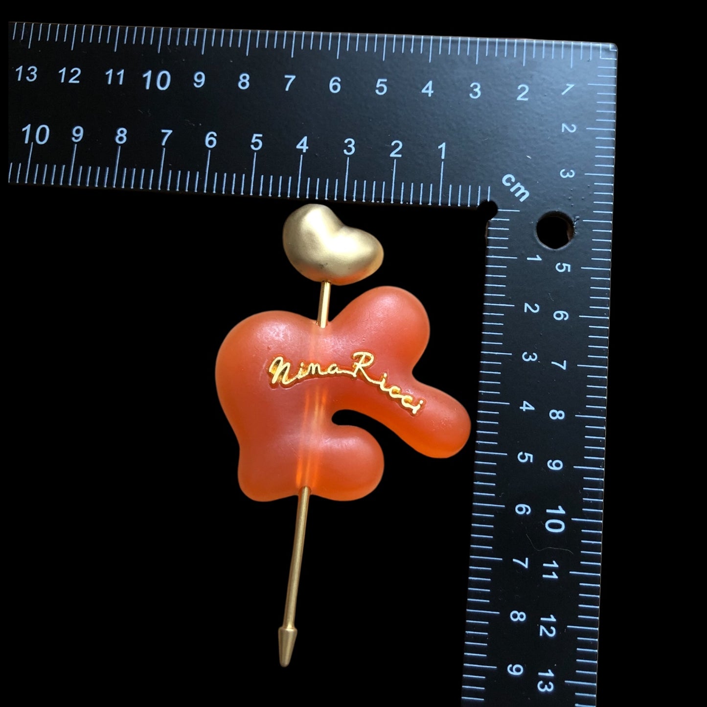 Brooch signed “Nina Ricci”