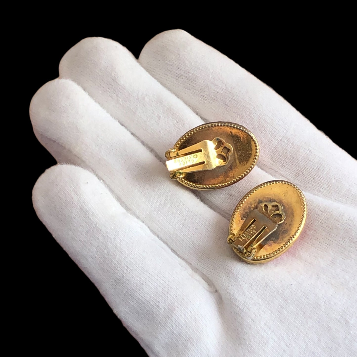 Clip earrings signed "Alice Caviness"