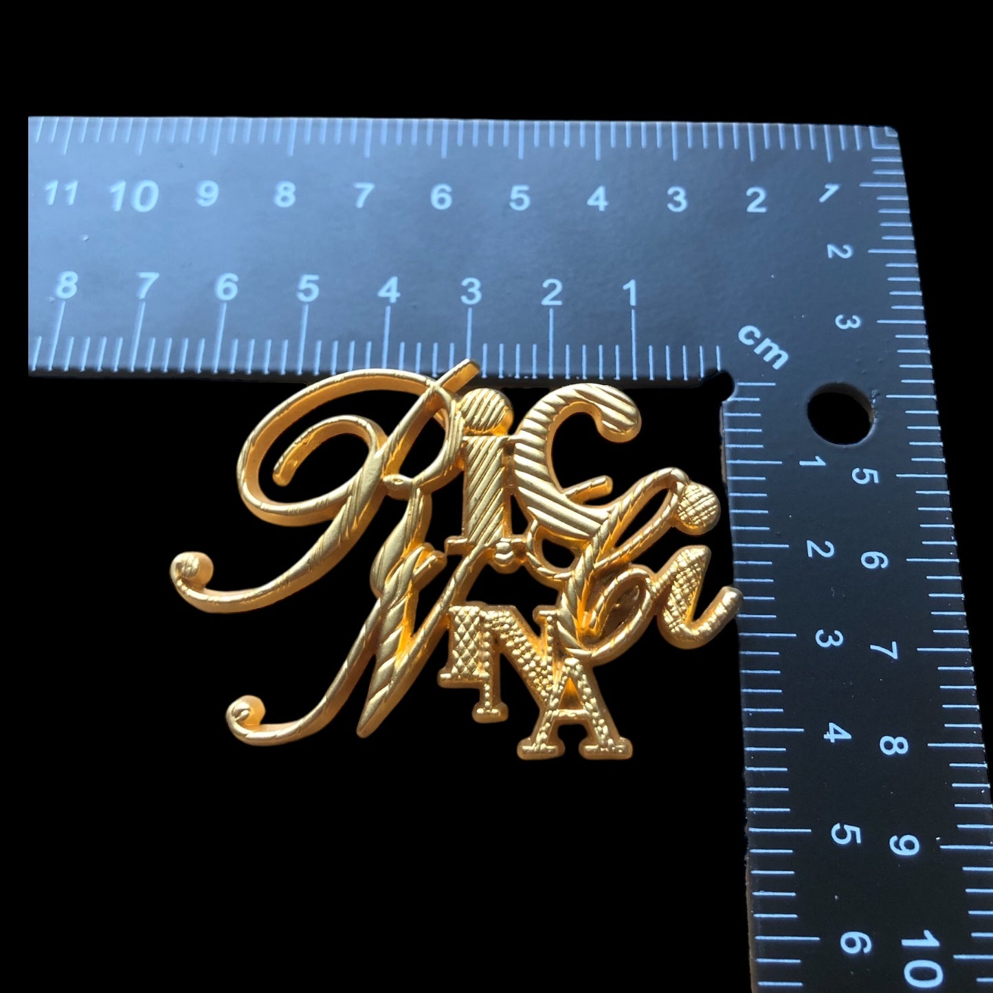 Brooch signed “Nina Ricci”
