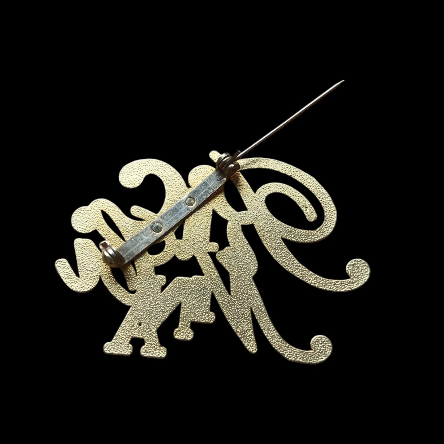 Brooch signed “Nina Ricci”