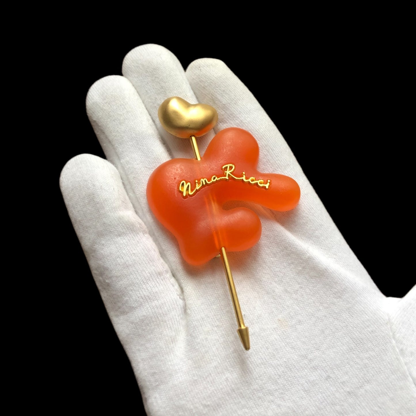 Brooch signed “Nina Ricci”