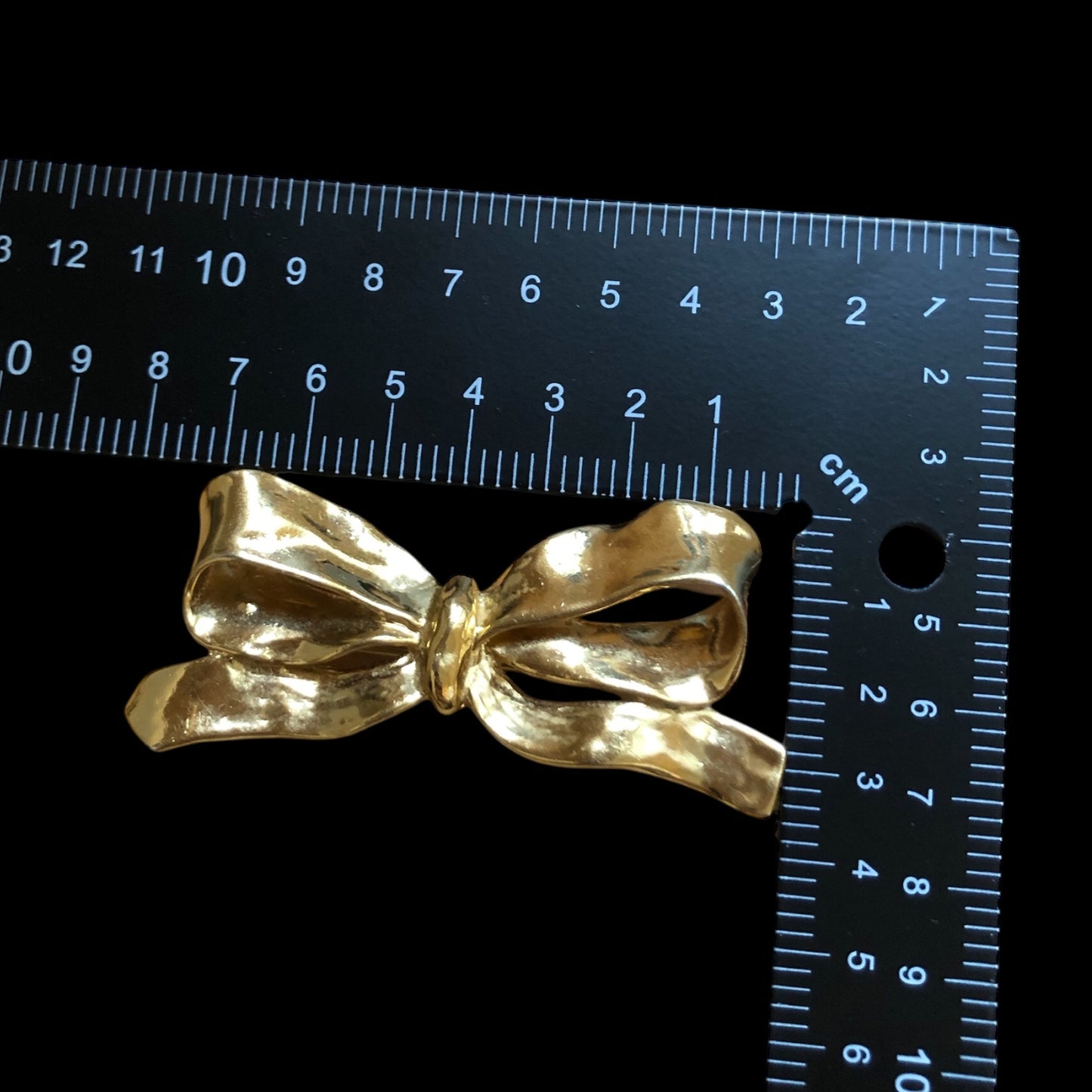 Brooch signed “Yves Saint Laurent”