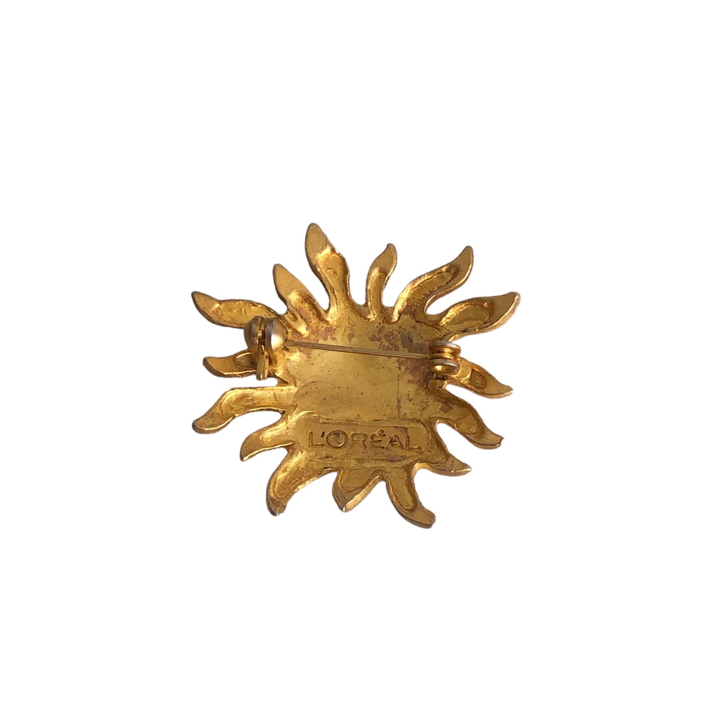 Brooch signed "L'Oréal"