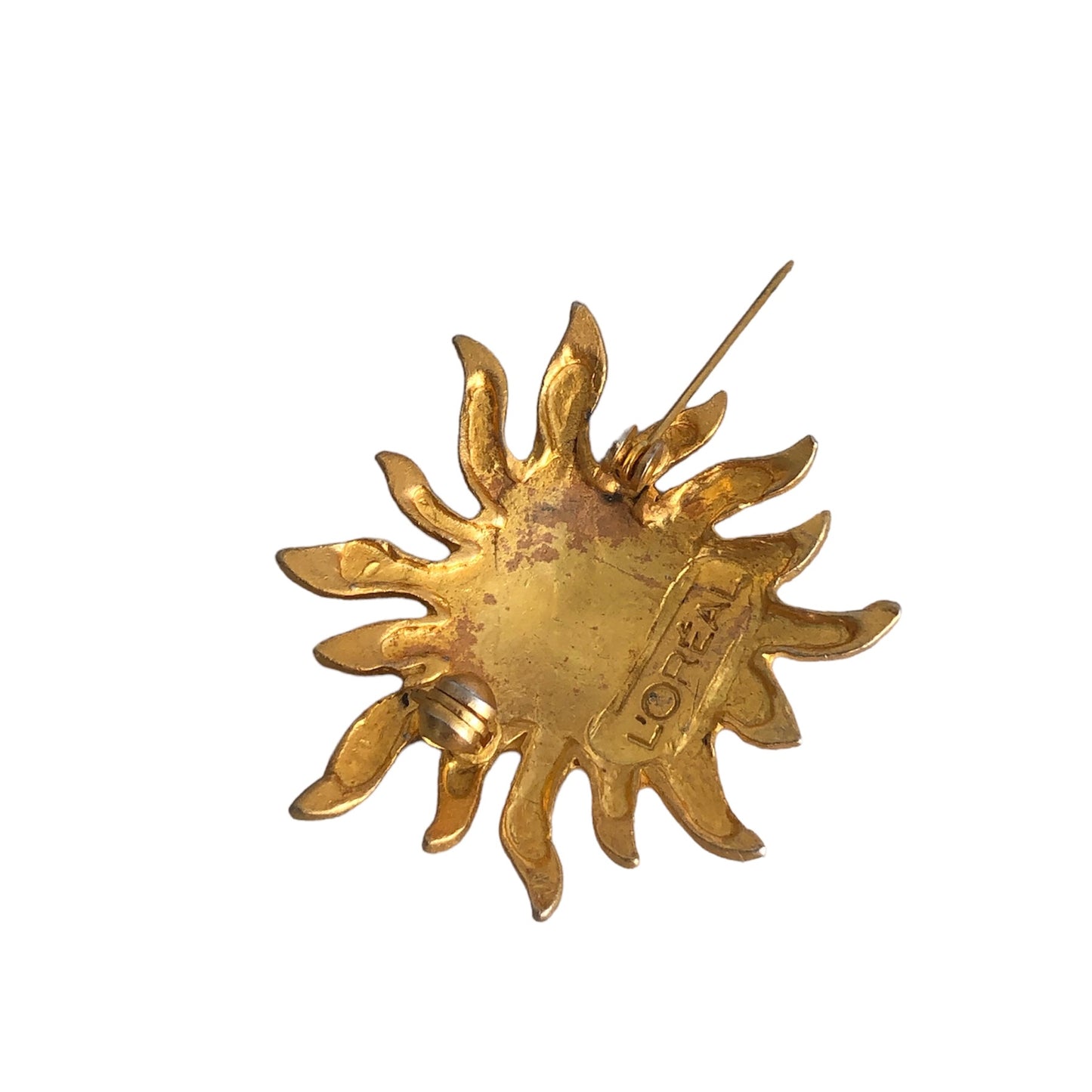 Brooch signed "L'Oréal"