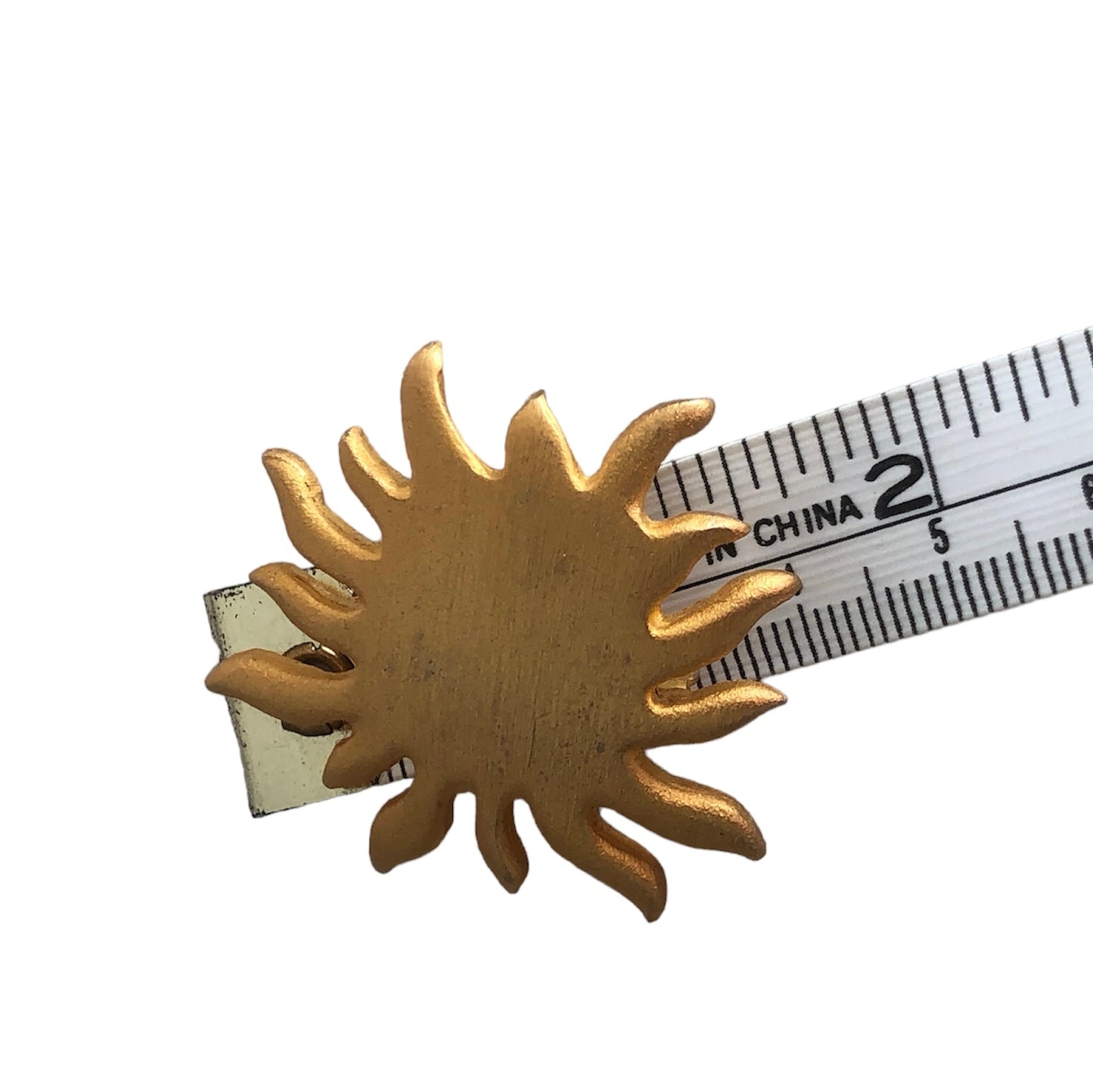 Brooch signed "L'Oréal"