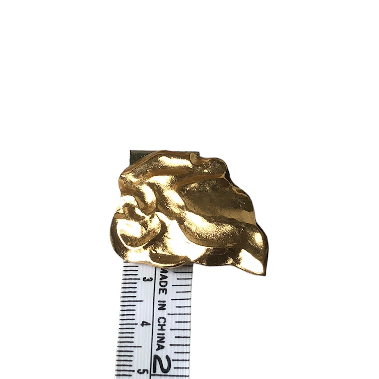 Brooch signed "Yves Saint Laurent"