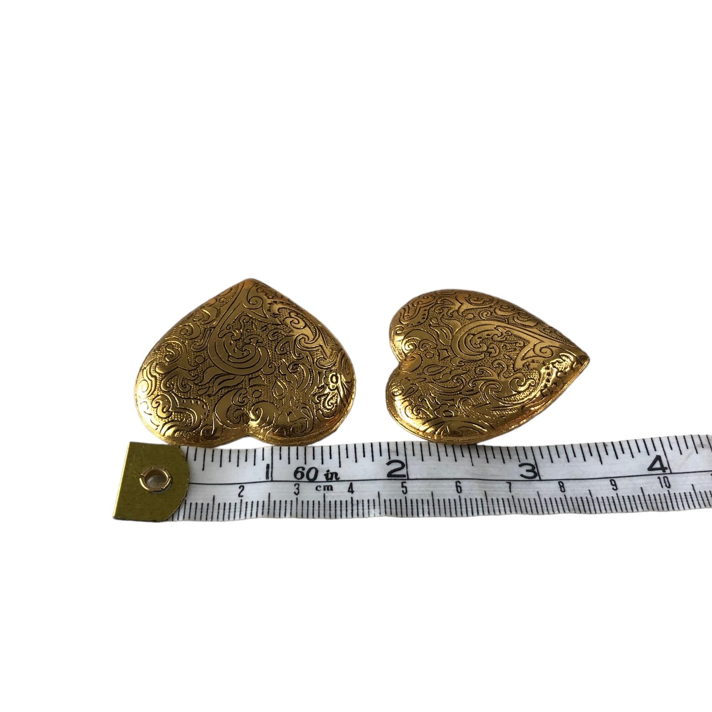 Clip earrings signed "Yves Saint Laurent"