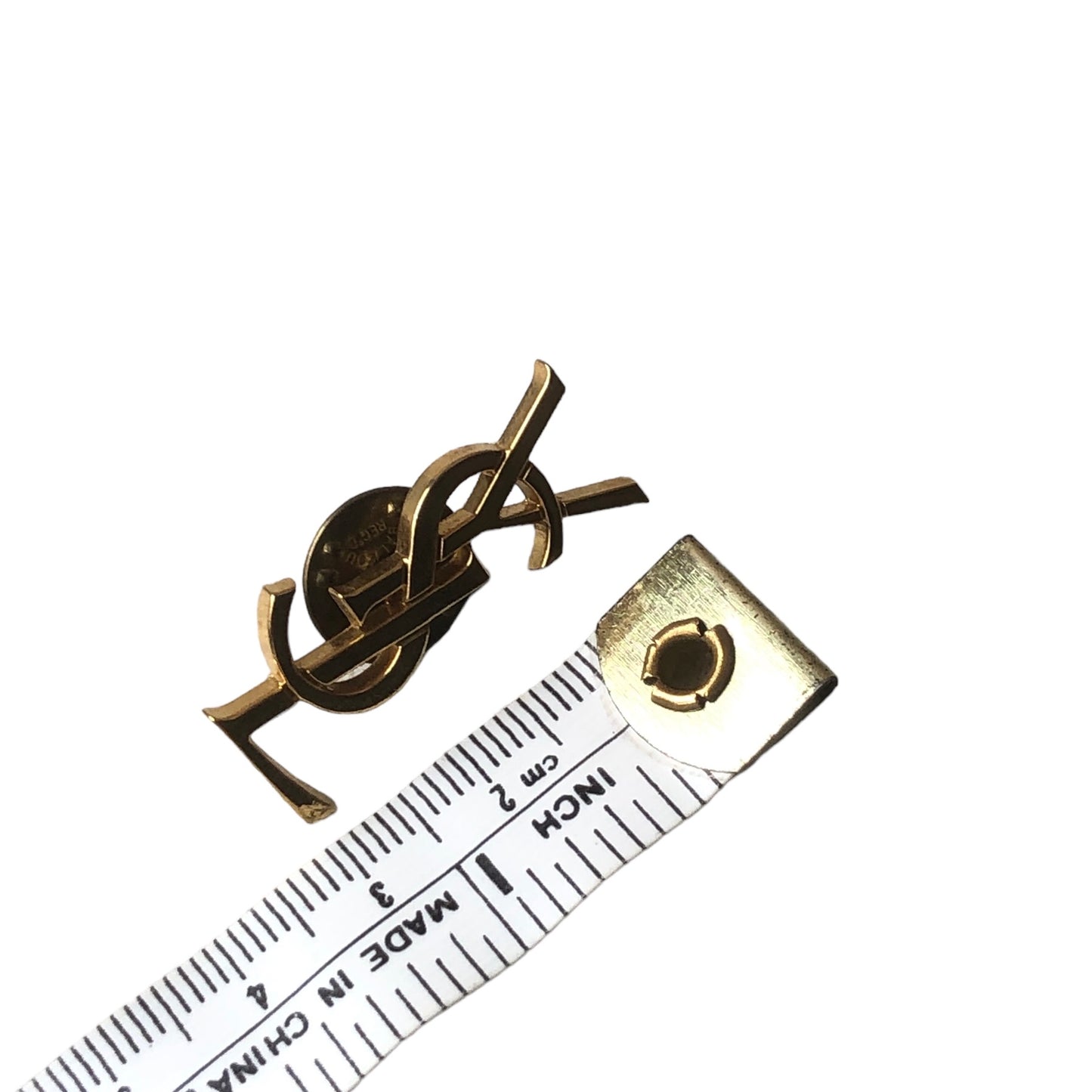 Brooch signed "Yves Saint Laurent"