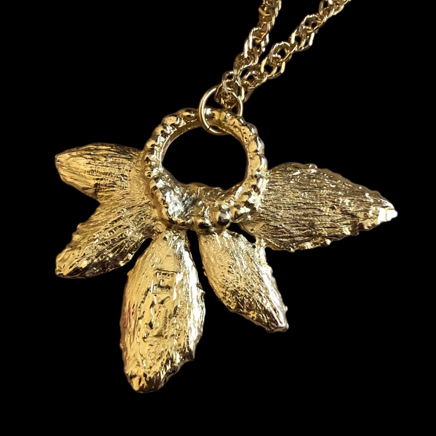 Pendant signed “Yves Saint Laurent”