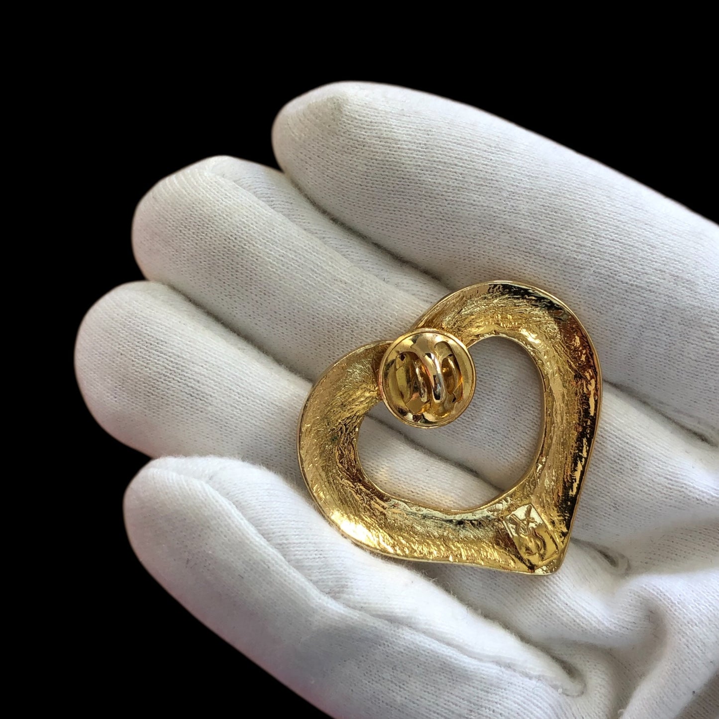 Brooch signed “Yves Saint Laurent”