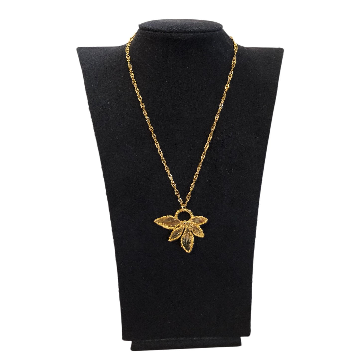 Pendant signed “Yves Saint Laurent”