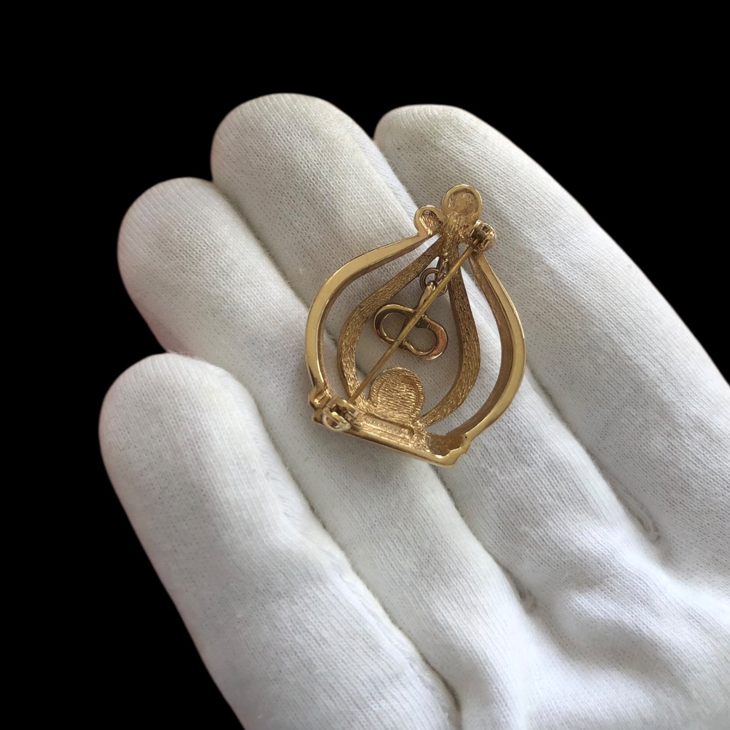 Brooch signed “Christian Dior”