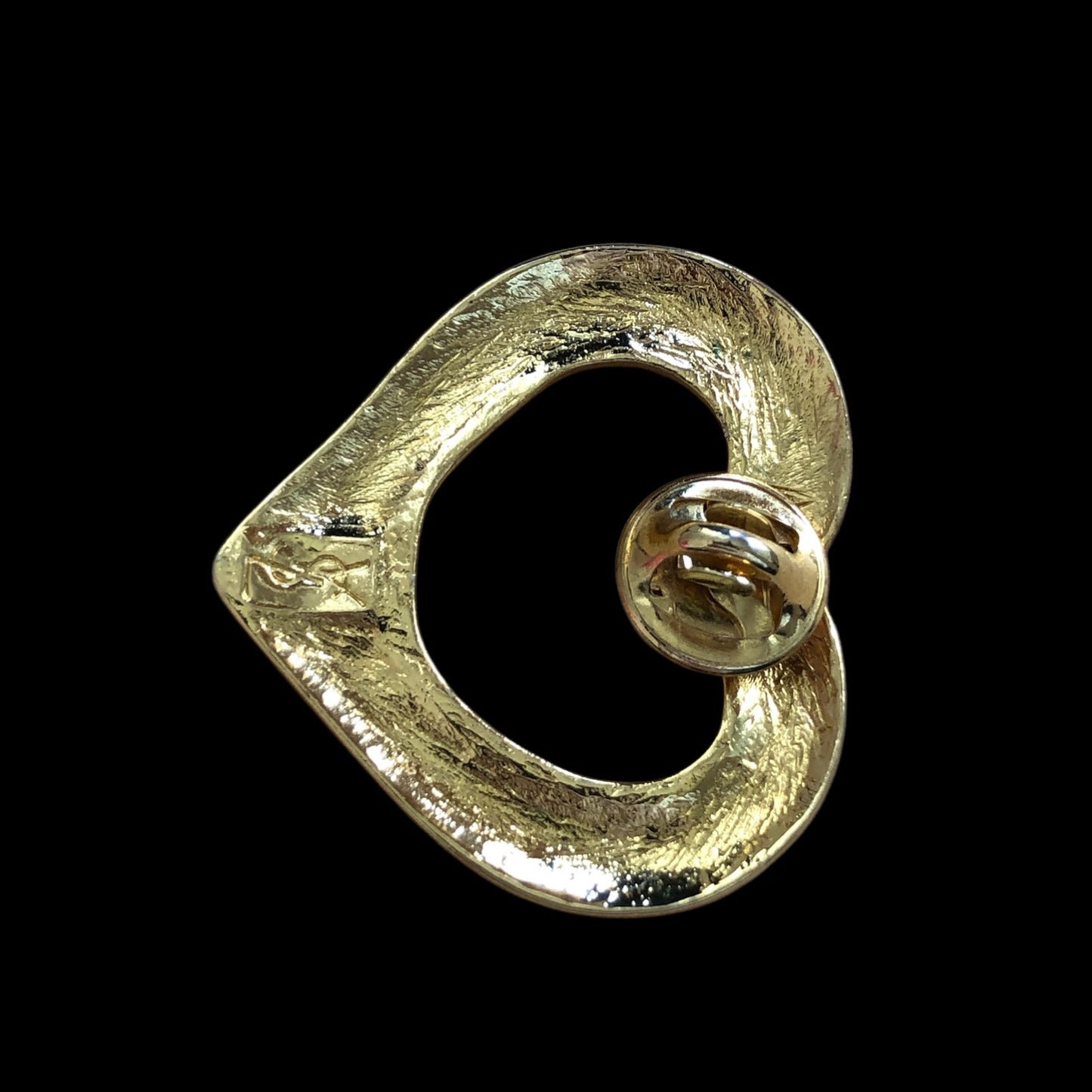 Brooch signed “Yves Saint Laurent”