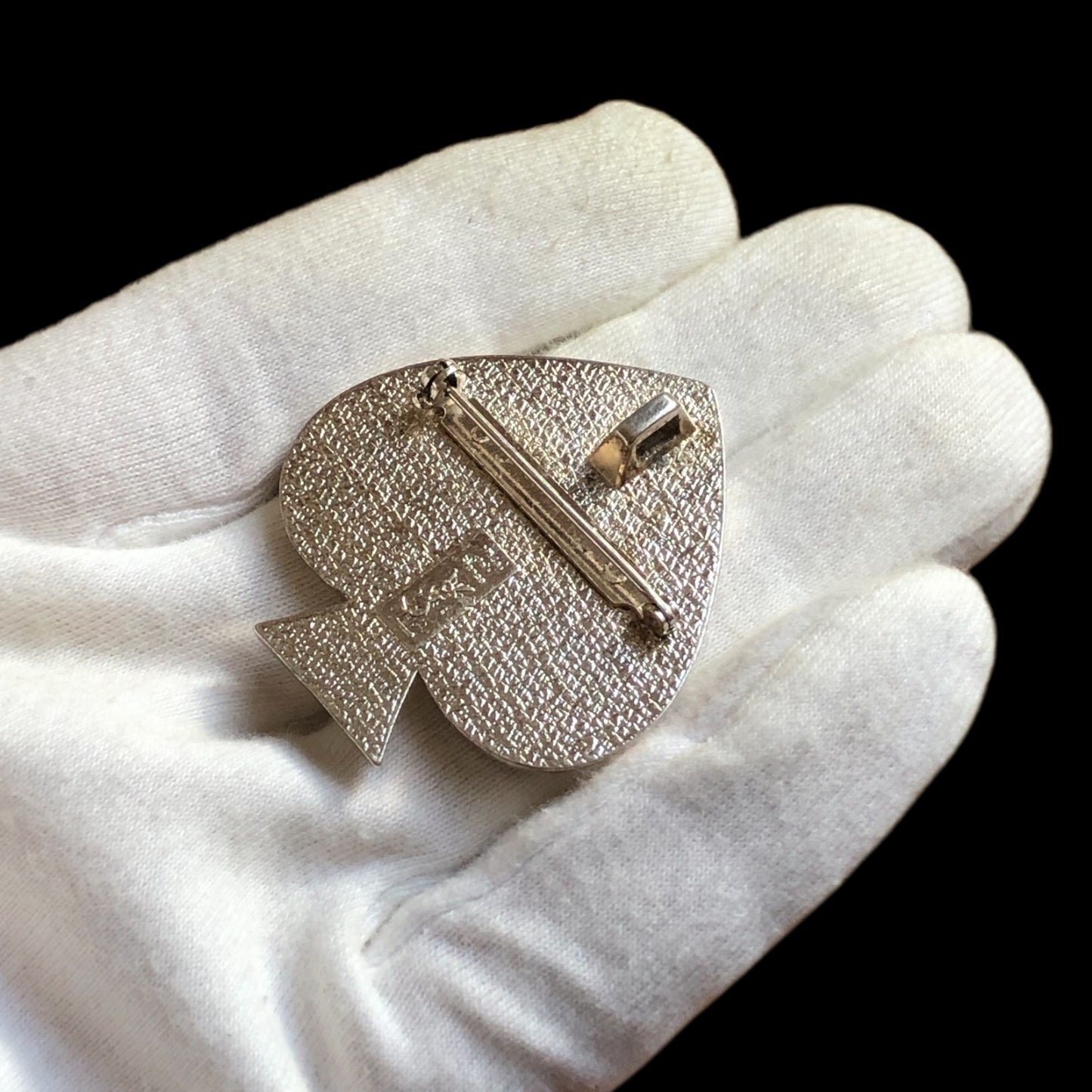 Brooch signed “Yves Saint Laurent”