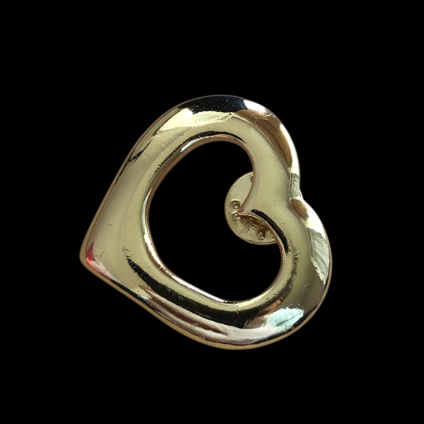 Brooch signed “Yves Saint Laurent”