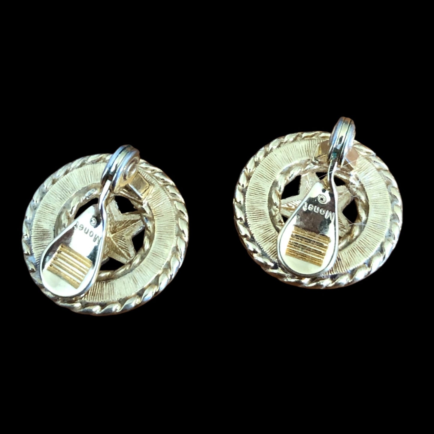 Clip earrings signed “Monet”