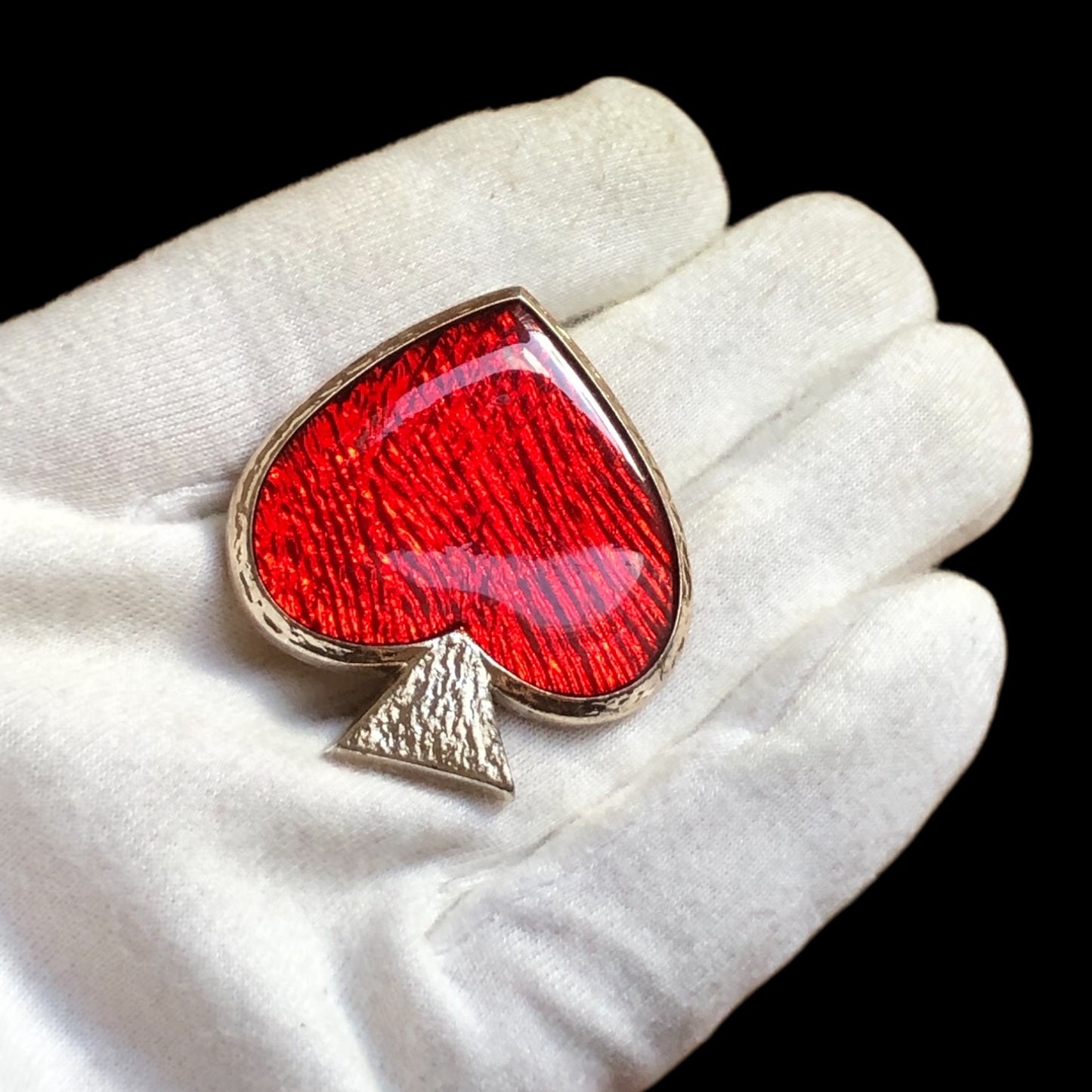 Brooch signed “Yves Saint Laurent”